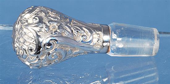 A pair of Edwardian silver mounted waisted glass decanter and stoppers,